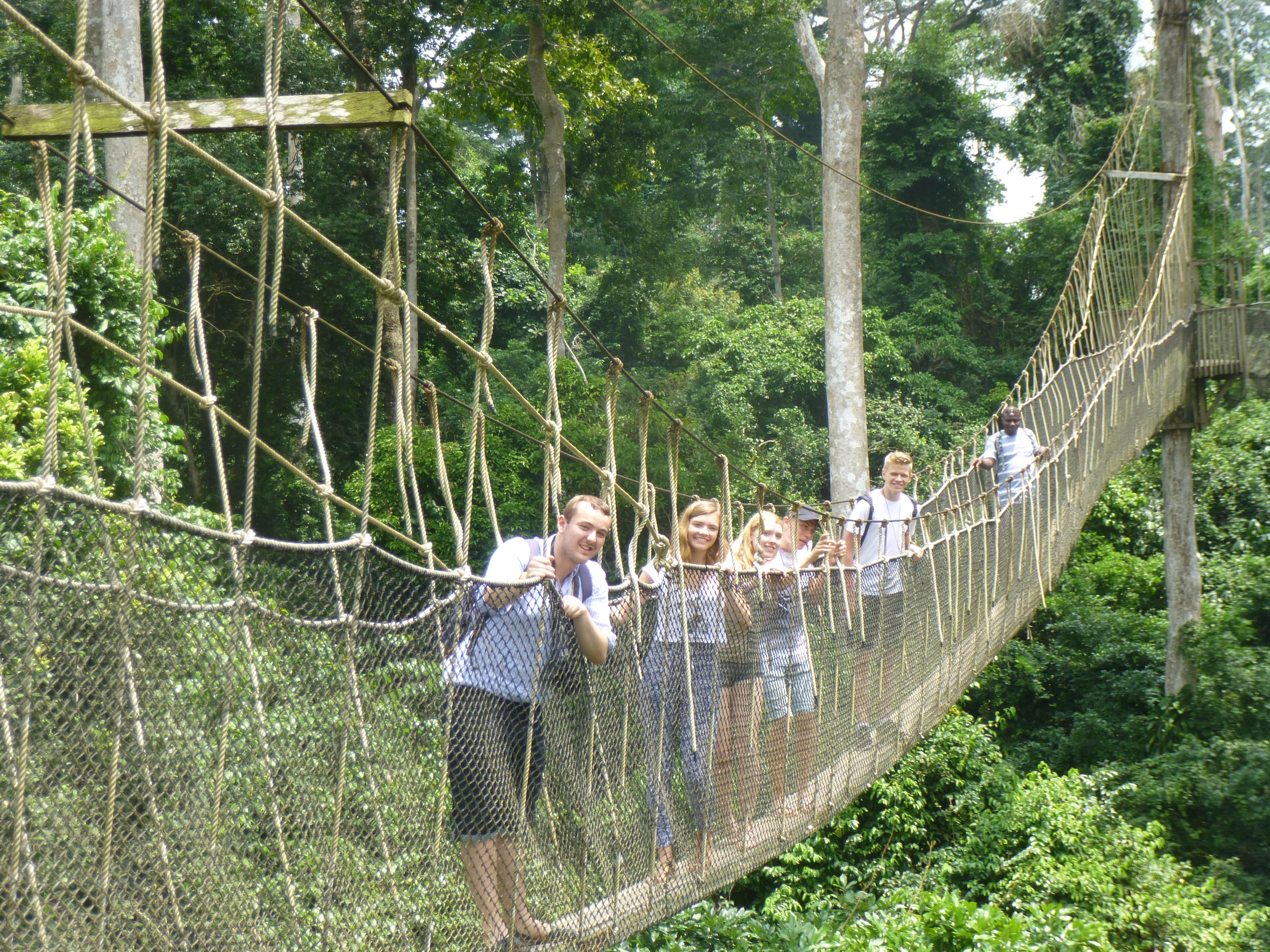 Projects Abroad teenage volunteers working with children in Ghana, take a break over the weekend and explore. While doing community volunteer work in Ghana, teenagers use the weekends to visit local attractions like a forest walk.